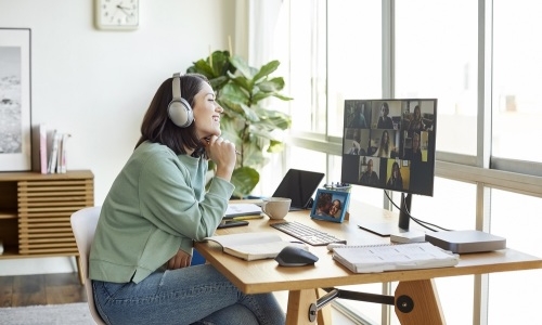 Woman taking parting in a video conference call