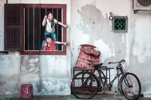 children looking for bicycle