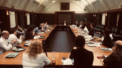 Scholars at the East Asia Forum sitting on a table at Westminister University