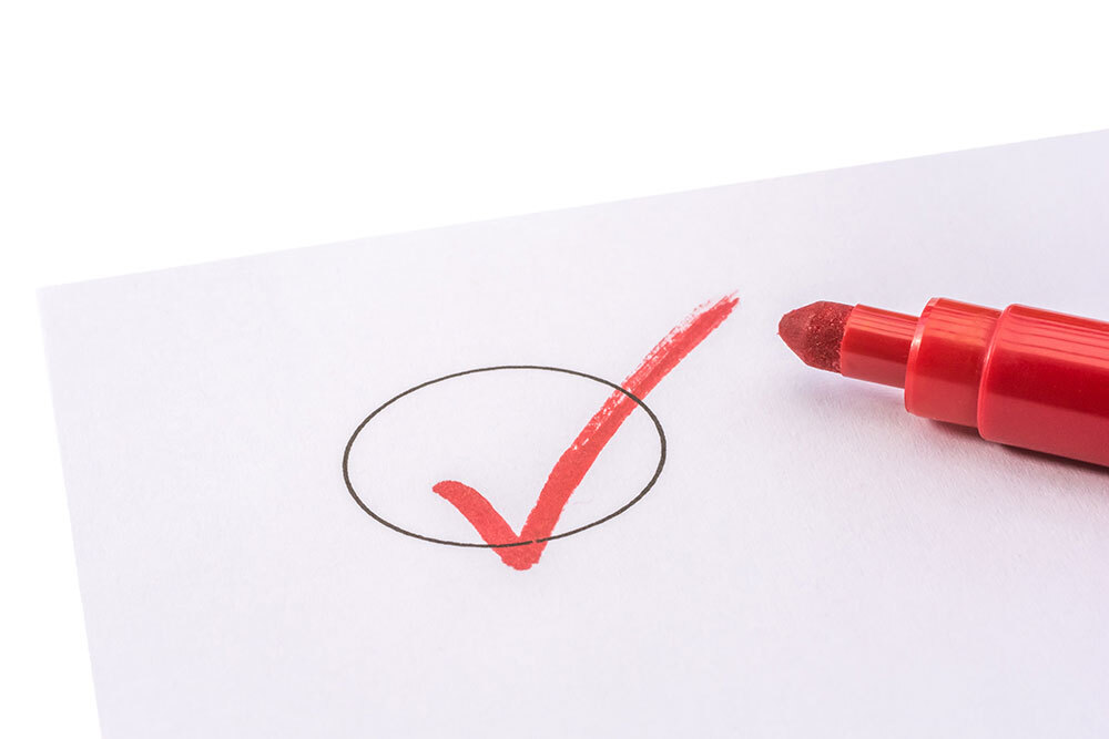 Checkliste mit einem roten Stift