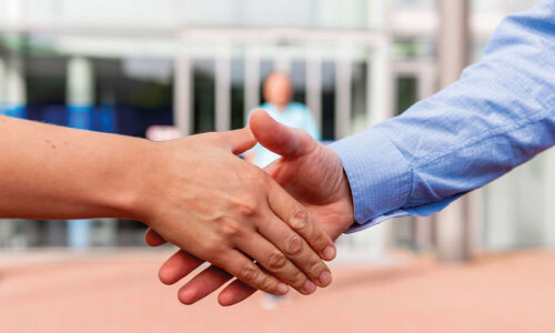 Two people shaking hands