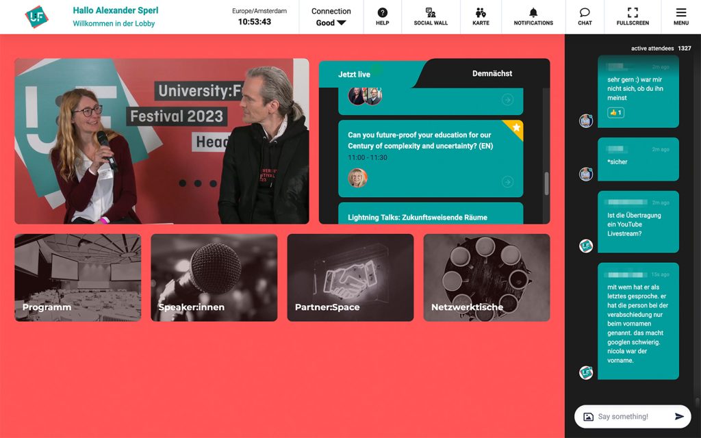Screenshot der Lobby des UFF, oben links Live-Stream mit Interview, daneben und darunter Kacheln mit weiteren Zugängen, rechts Chat